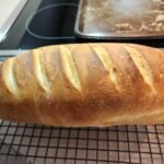 Freshly baked bread on cooling rack