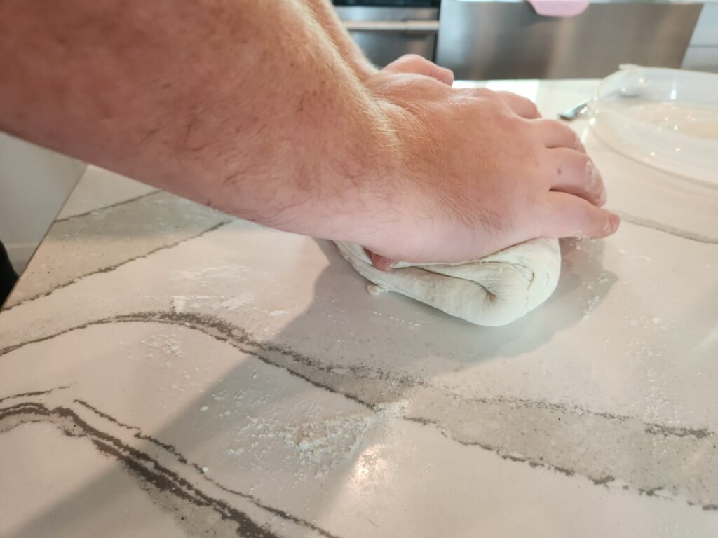 Kneading dough with hands