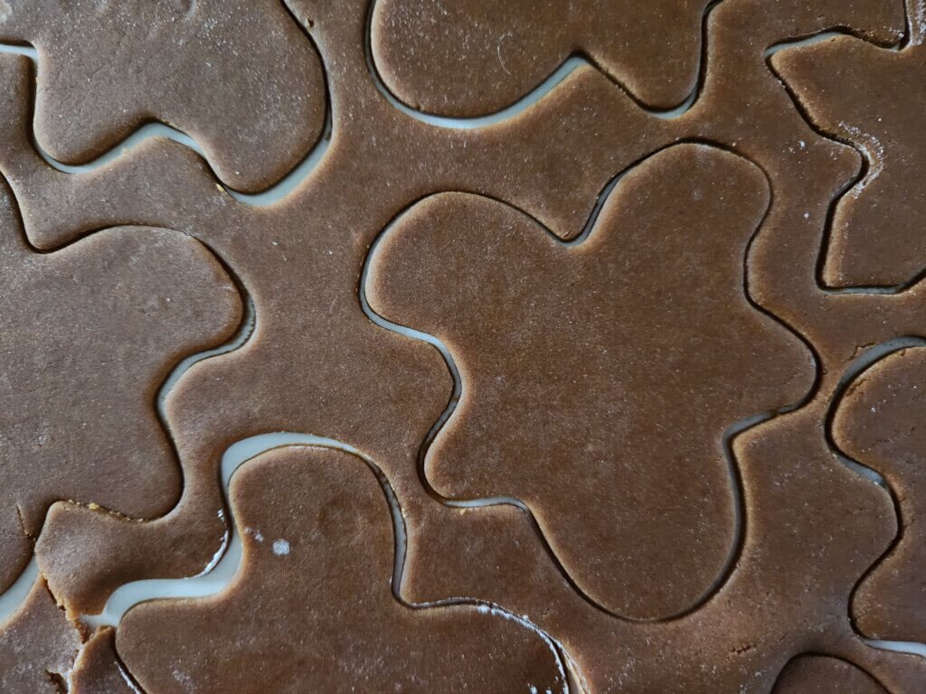 Soft gingerbread cookie cutouts before baking