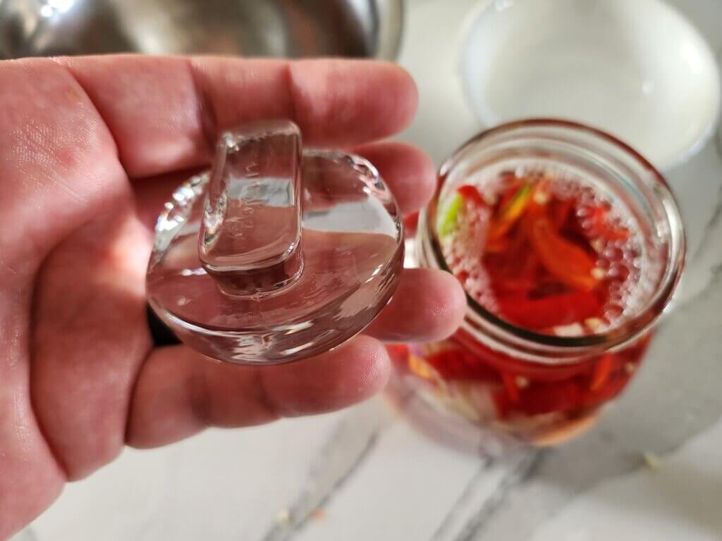 Fermentation weight to keep cayenne pepper hot sauce under the brine.