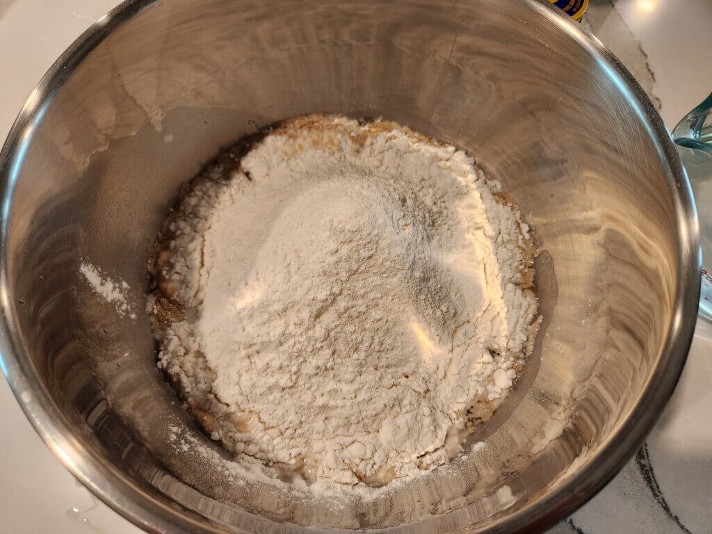 Focaccia ingredients added to bowl