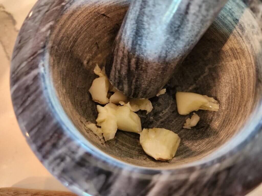 Raw Garlic Mashed to Release Allicin in Mortar