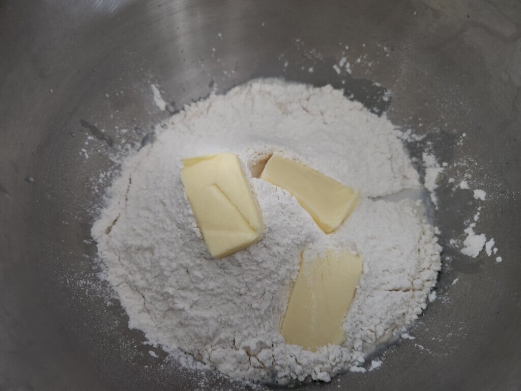 All fresh bread ingredients added to stand mixer bowl