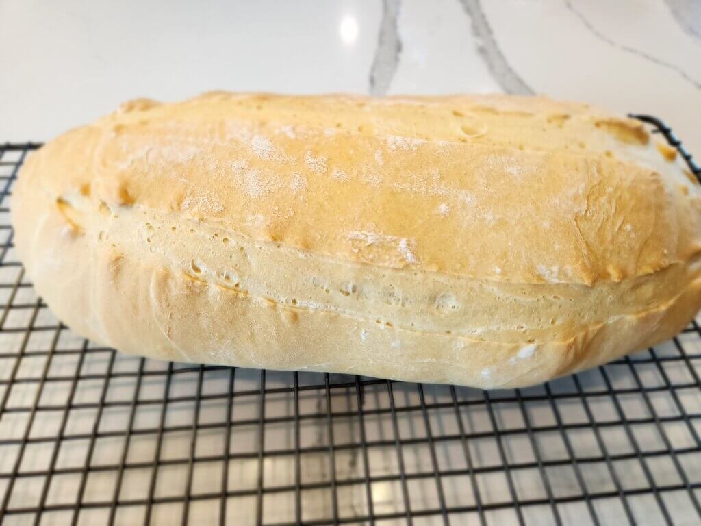 Fresh bread cooling on drying rack