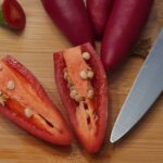 Jalapeno pepper cut in two to show viable pepper seeds