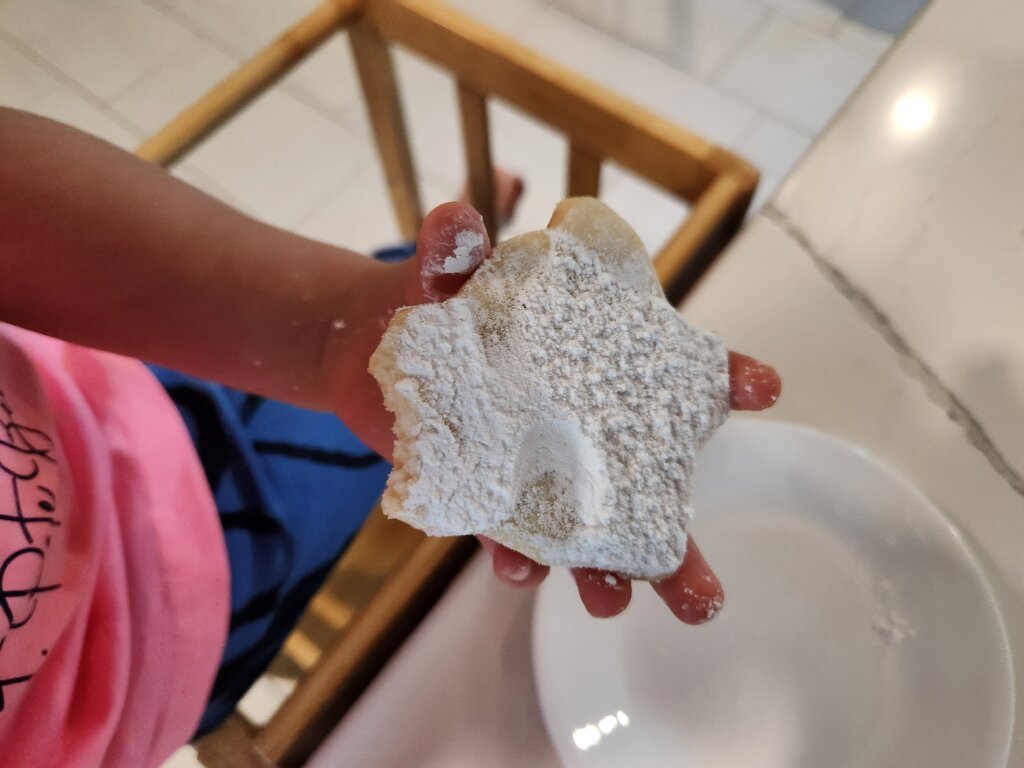 Little Girl Eating Kourabiedes