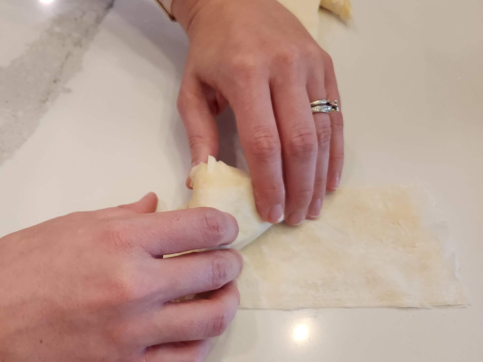 Mid-Fold of the Triangle Cheese Pie