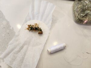 Add Herbs to the middle of the coffee filter