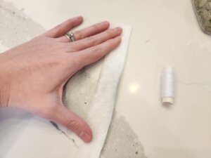 Then fold over the other side. Ensuring they overlap