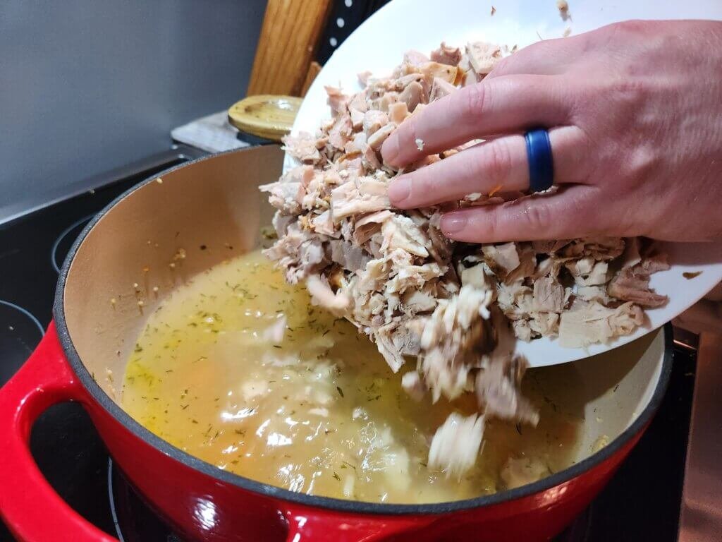 adding diced leftover turkey to soup