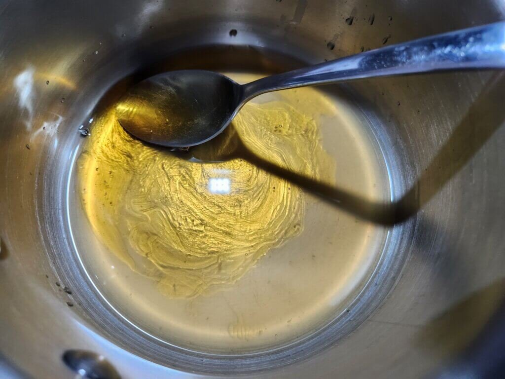 Mixing ACV with honey in sauce pot