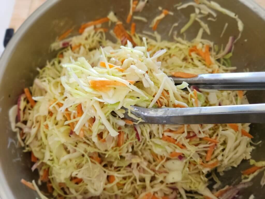 Creamy homemade coleslaw recipe with fresh cabbage carrots and homemade dressing