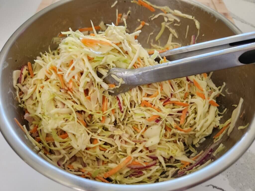 Fresh homemade creamy coleslaw in large serving bowl