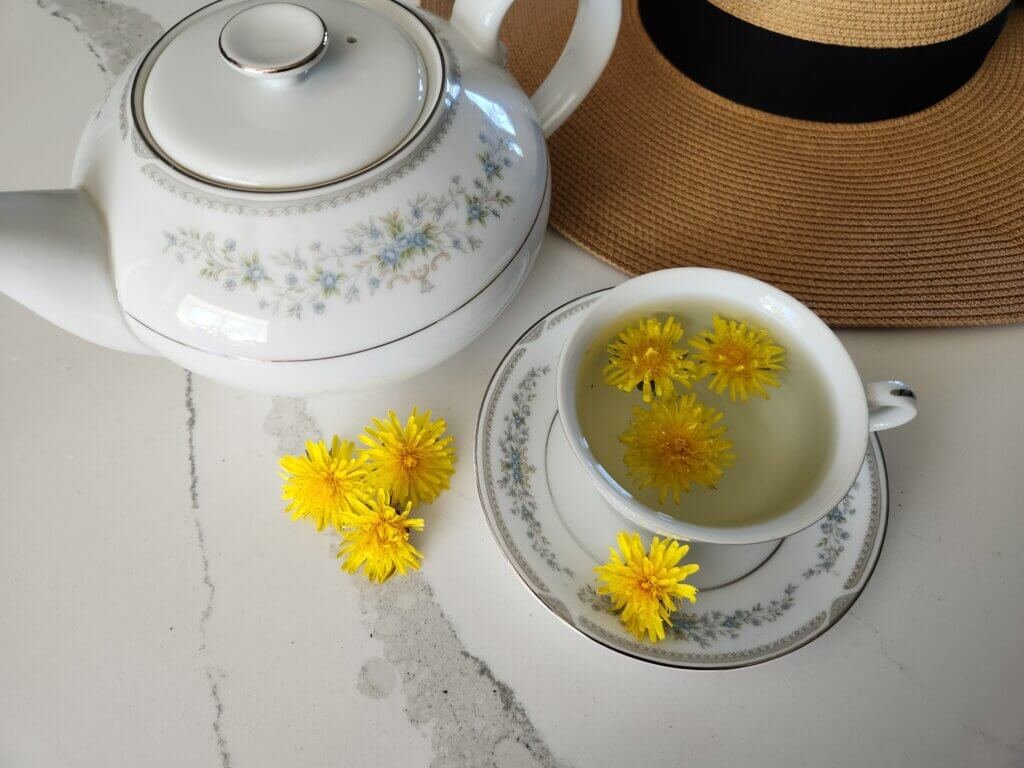 Vintage Floral Tea Set with Dandelion Tea and Fresh Yellow Flowers