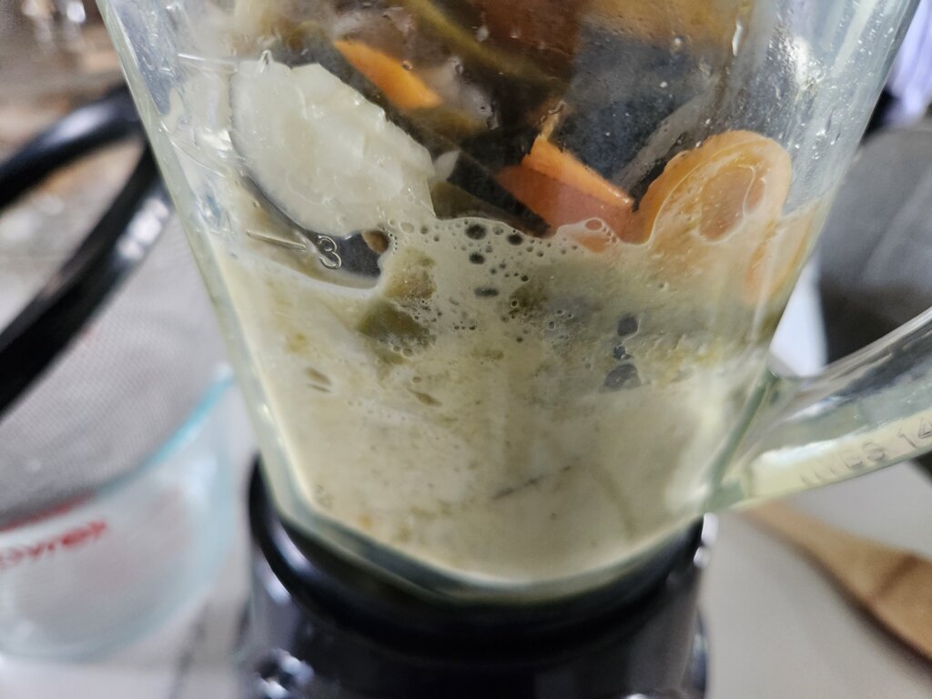 Blending fermented jalapeños and vegetables with reserved brine